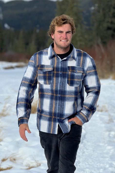 Brush Flannel Shacket in Blue & Caramel Plaid. 75% polyester, 25% cotton. 2 breast pocket.