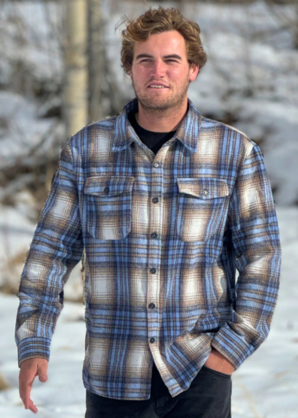 Brush Flannel Shacket in Blue & Sand Plaid. 75% polyester and 25% cotton. Brushed on both sides for that flannel feel. 2 breast pockets. Gender neutral.