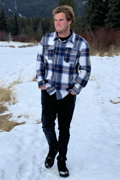 Brush Flannel Shacket in Blue & Caramel Plaid. 75% polyester, 25% cotton. 2 breast pocket.