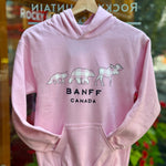 Kids Baby pink hoodie with animal graphics and 'Banff Canada' text on a hanger.