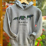 Kids grey hoodie with bear and moose design and 'Banff Canada' text on a hanger.