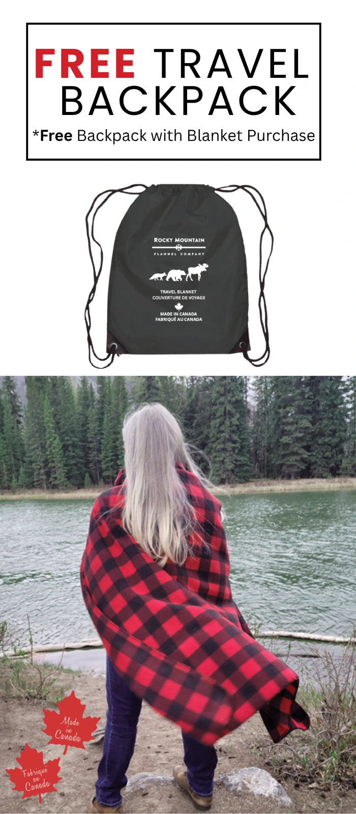 Person wrapped in a red and black checkered blanket by a lake, with a free travel backpack offer.