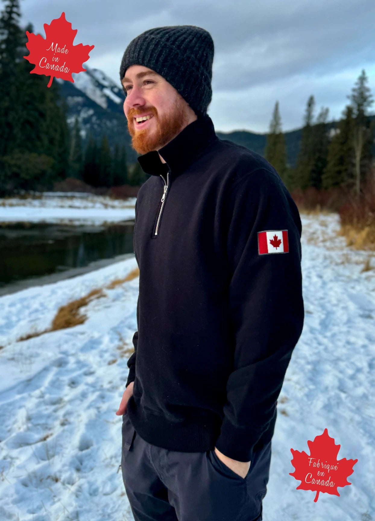 Black quarter zip polo with canada flag logo on left arm.