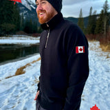 Black quarter zip polo with canada flag logo on left arm.