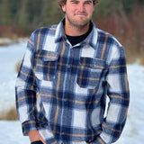 Brush Flannel Shacket in  Blue & Caramel Plaid. 75% Polyester, 25% cotton. 2 breast pockets.