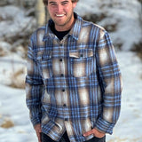 Generous men's cut. Long sleeve, long torso. It will have a dropped shoulder appearance as seen here.