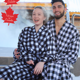 Two people wearing black and white buffalo check robes with a 'Made in Canada' leaf logo in the corner. Photos are set in Banff, Canada