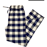 Navy and cream checkered pants on a white background with 'RESTOCKED' label.