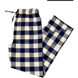 Navy and cream checkered pants on a white background with 'RESTOCKED' label.