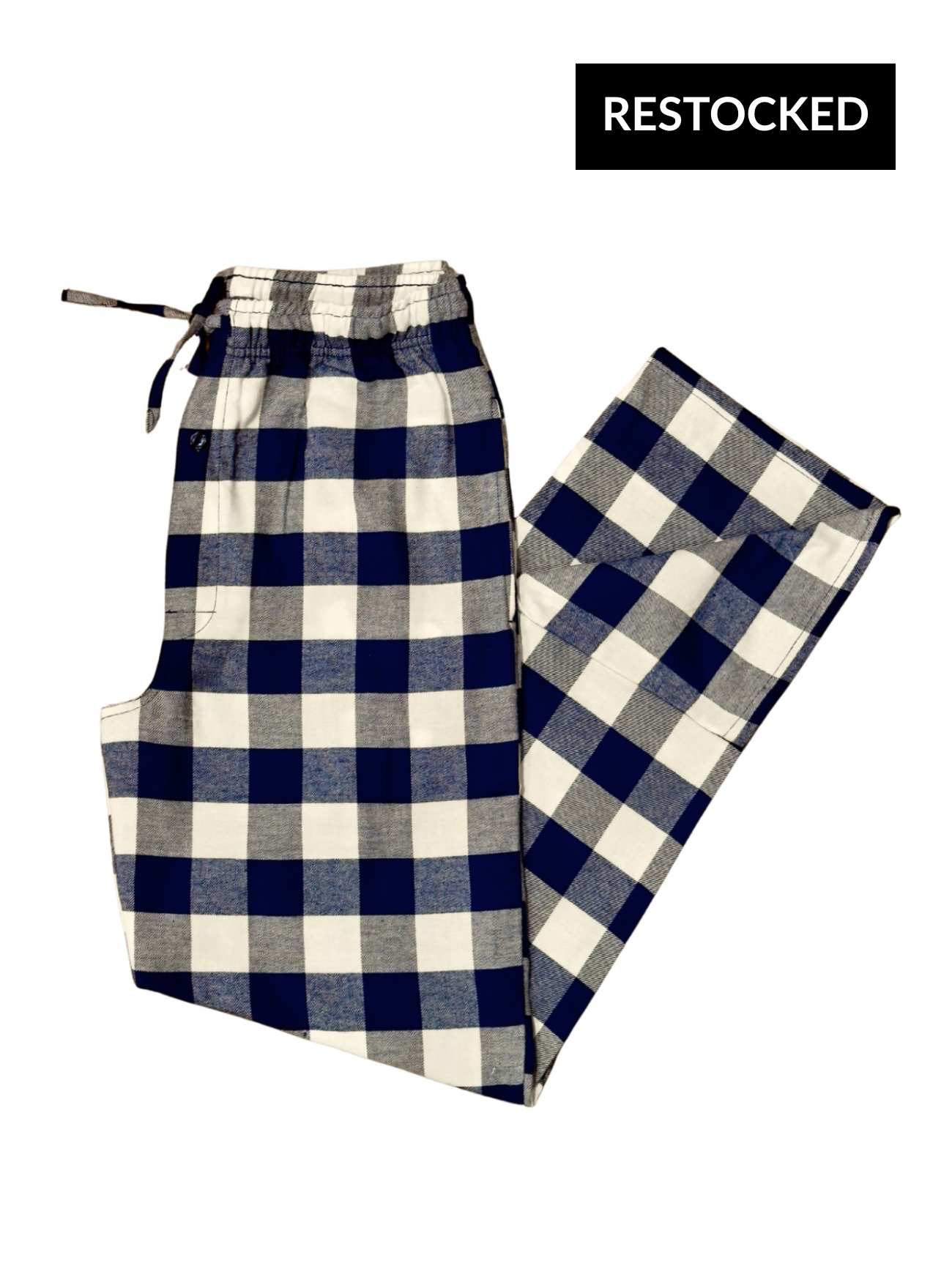 Navy and cream checkered pants on a white background with 'RESTOCKED' label.