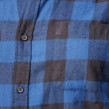 Close up of long-sleeved marine blue and black buffalo check flannel shirt.