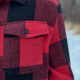 Canadian classic red jacket, close up of the pocket.