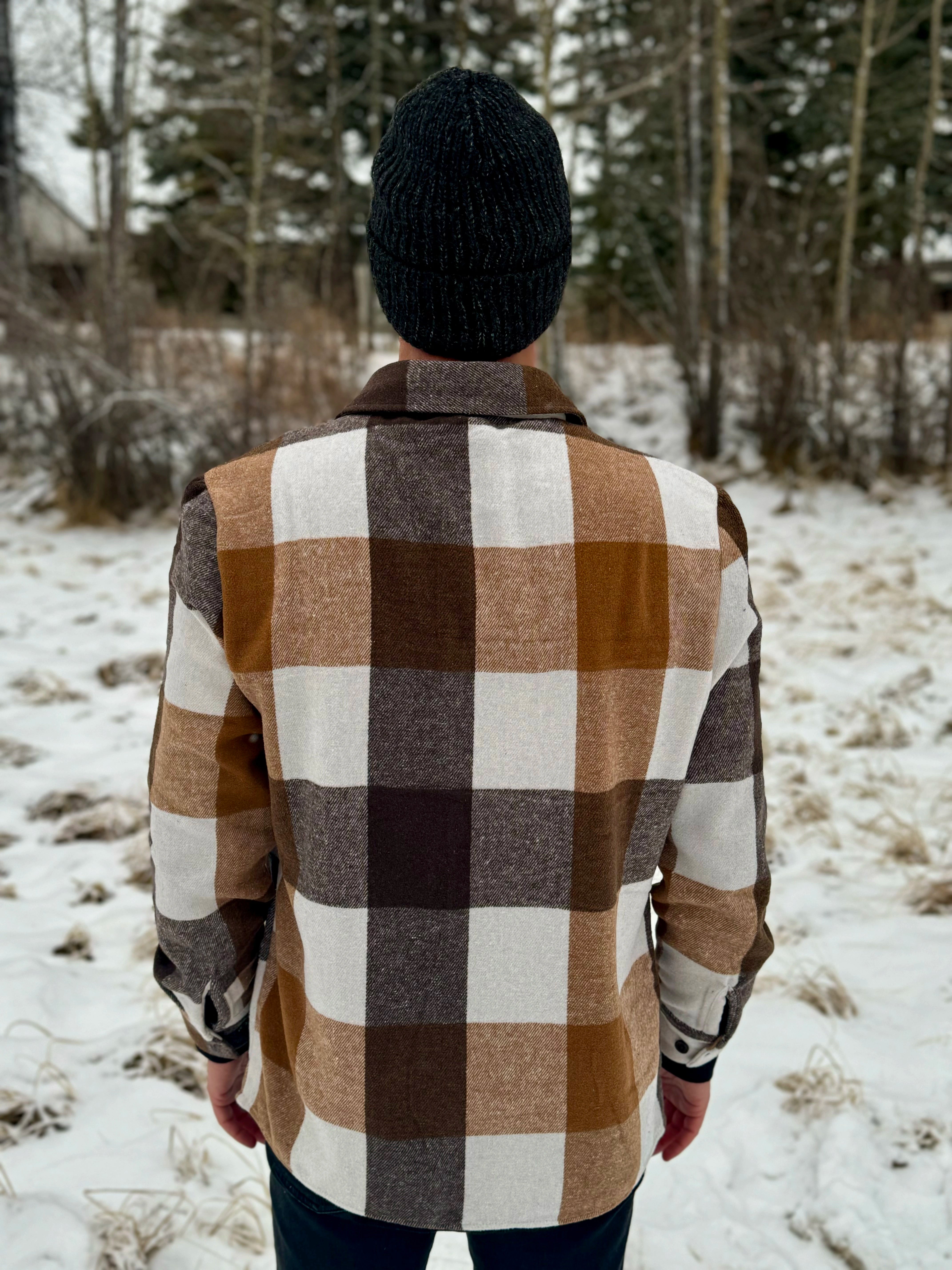 Back view of brown check jacket. The material is 75% polyester / 25% Cotton yarn dyed for that soft feel. 