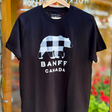 Black t-shirt with a bear graphic and 'Banff Canada' text on a hanger.