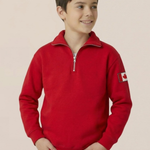 Child wearing a red polo with a Canadian flag patch on a beige background
